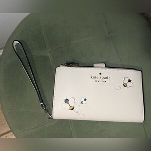 Kate Spade Cream Wristlet with Bee Motif